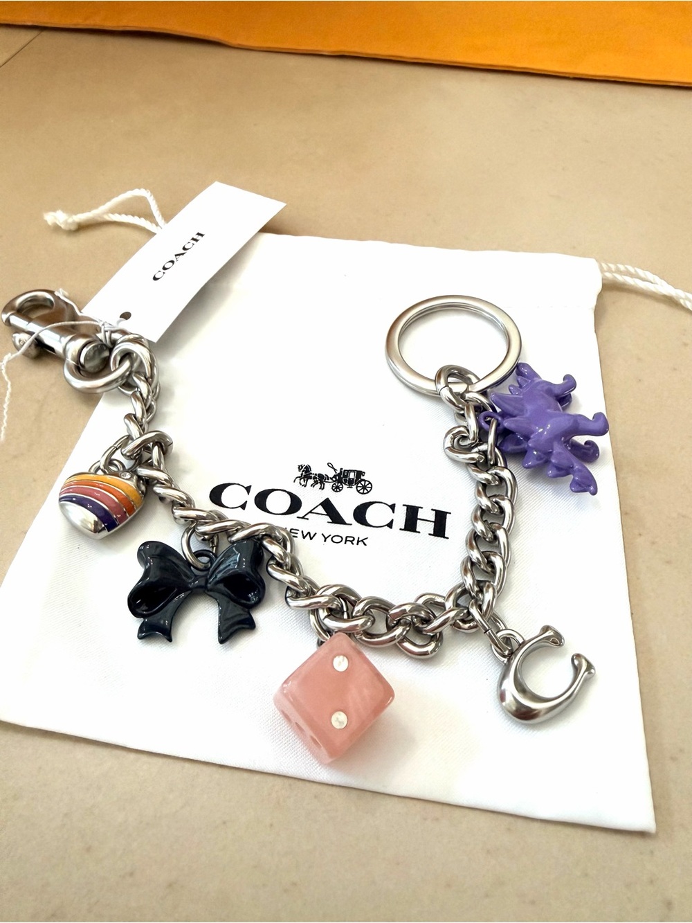 Coach Silver-Tone Charm Keychain with Multicolor Enamel Charms